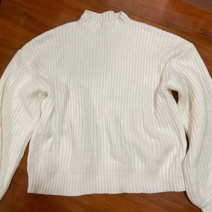 white mid neck sweater